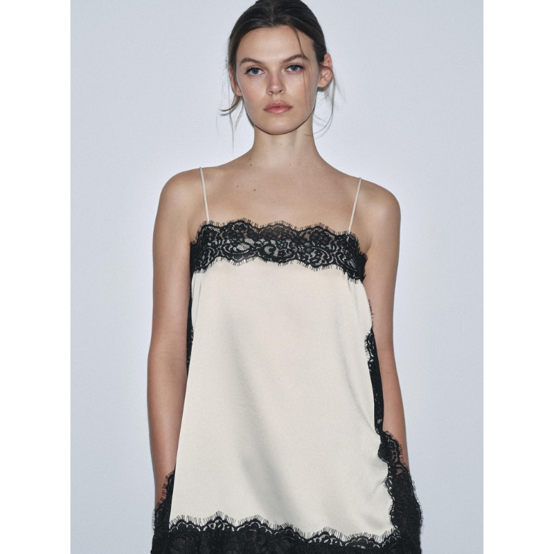 SAINT CLAIRE velour lace camisole featuring delicate lace trim and soft velour fabric, displayed on a neutral background.