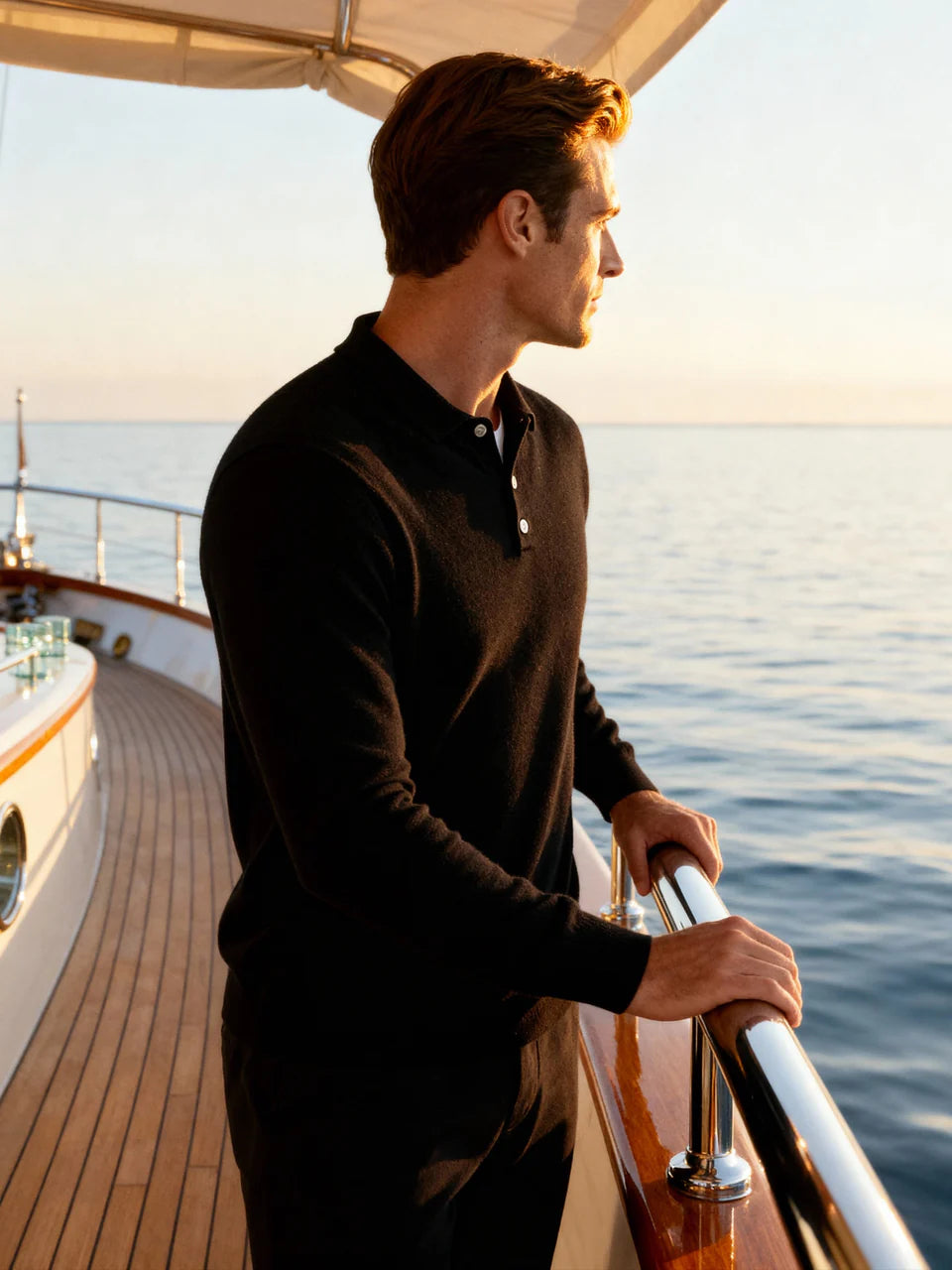 Saint Moritz 100% cashmere Kensington classic polo shirt, light blue with collar and buttons, displayed on a hanger.
