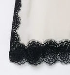 SAINT CLAIRE velour lace camisole in soft fabric with delicate lace trim, shown on a hanger against a neutral background.