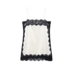SAINT CLAIRE velour lace camisole featuring delicate lace details and a soft velour fabric, shown in a close-up view.