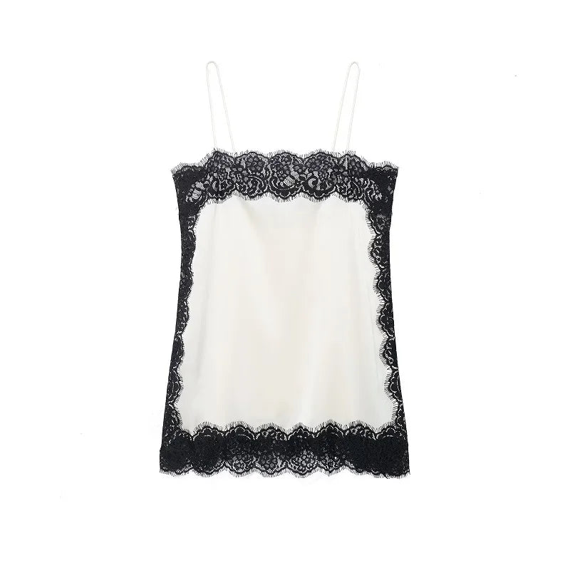 SAINT CLAIRE velour lace camisole featuring delicate lace details and a soft velour fabric, shown in a close-up view.