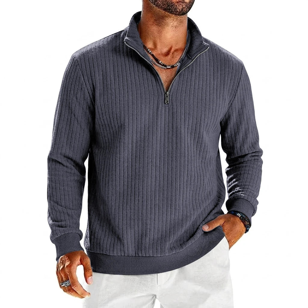 Saint Moritz Aspen striped half-zip sweater displayed on a hanger, featuring a classic design with bold stripes and a half-zip collar.