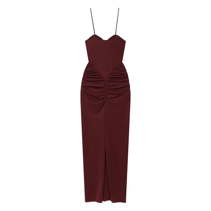 Saint Claire Riviera satin dress displayed on a hanger, showcasing smooth fabric and elegant design in a stylish wardrobe setting.