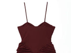 Saint Claire Riviera Satin Dress displayed on a hanger, showcasing its smooth satin fabric and elegant design.