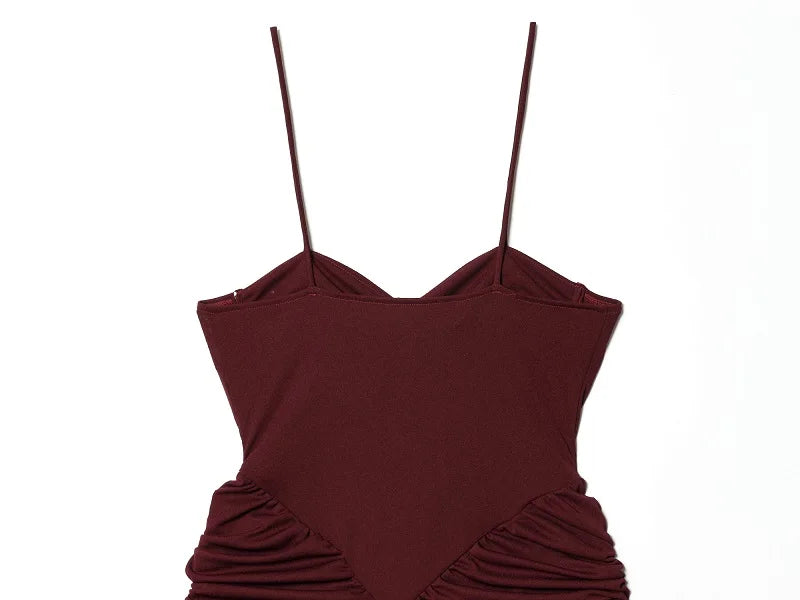 Saint Claire Riviera Satin Dress displayed on a hanger, showcasing its smooth satin fabric and elegant design.