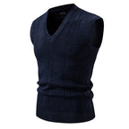 Saint Moritz Windsor sweater vest in navy with ribbed neckline and armholes, styled over a shirt for a classic layered look.