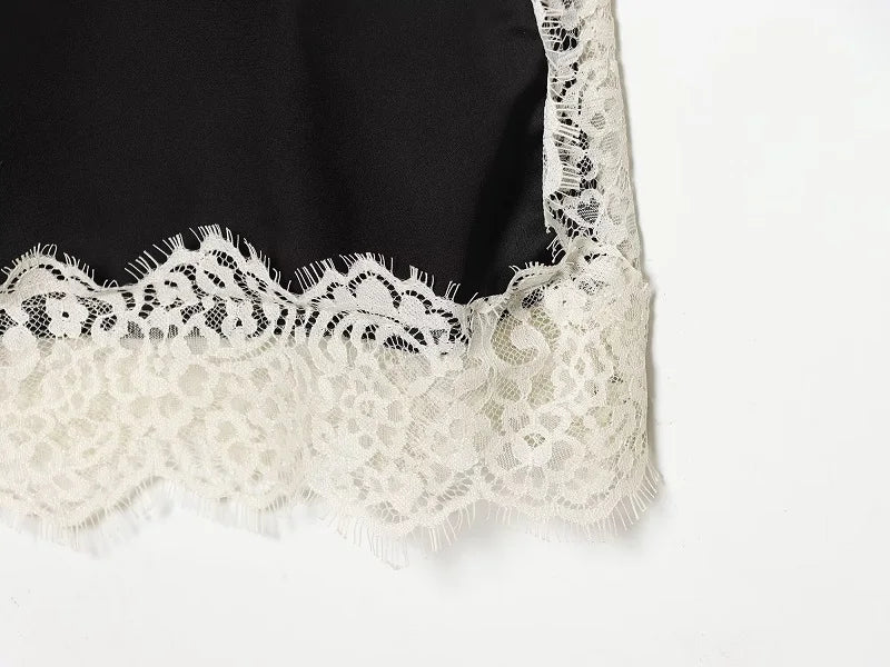 SAINT CLAIRE velour lace camisole featuring delicate lace trim and soft velour fabric, shown on a neutral background.