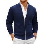 Saint Moritz Mont Blanc zip-up sweater, navy knit with front zipper and ribbed cuffs, displayed on a hanger.