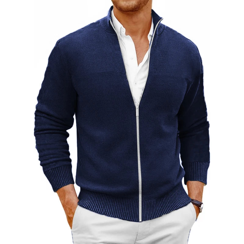Saint Moritz Mont Blanc zip-up sweater, navy knit with front zipper and ribbed cuffs, displayed on a hanger.