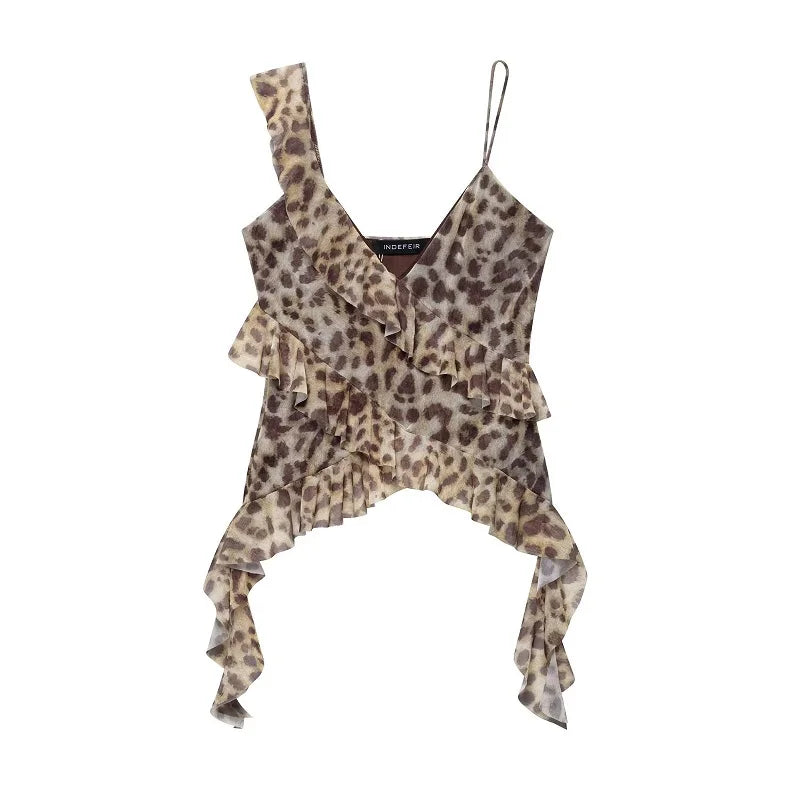 SAINT CLAIRE Marbella Statement Top showcasing a stylish, patterned blouse with ruffled details and vibrant colors.