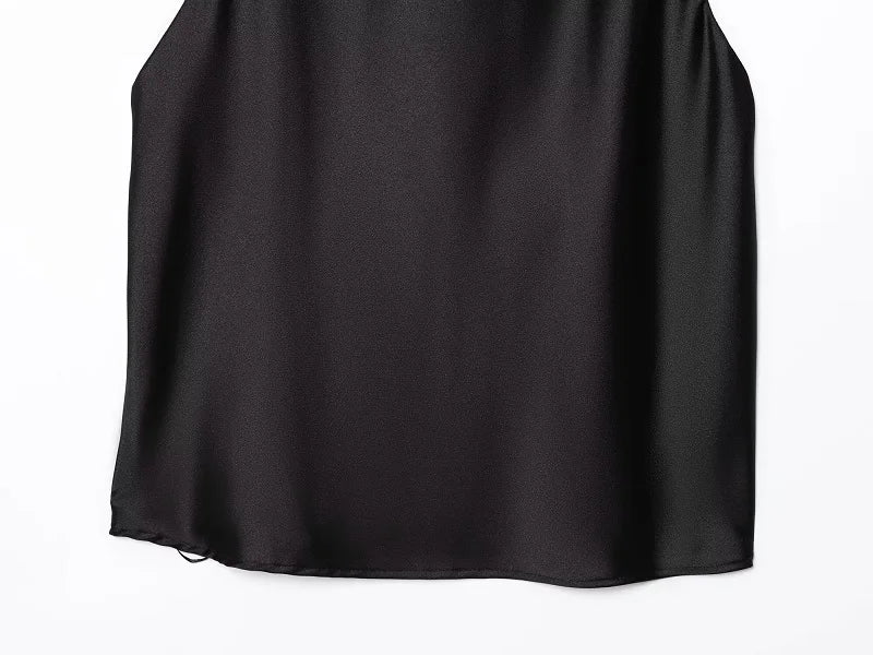 Saint Claire Noir satin backless camisole featuring smooth fabric and delicate straps, stylish nightwear or layered top option.