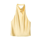 Saint Claire Noir satin backless camisole featuring sleek fabric and elegant design, shown on a model.