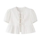 SAINT CLAIRE Aurélie ruffle blouse in lightweight fabric with feminine ruffle details and long sleeves.