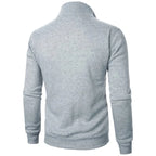 Saint Moritz Alpine zip-up knit jacket in cozy wool with a high collar and front zipper, displayed on a neutral background.
