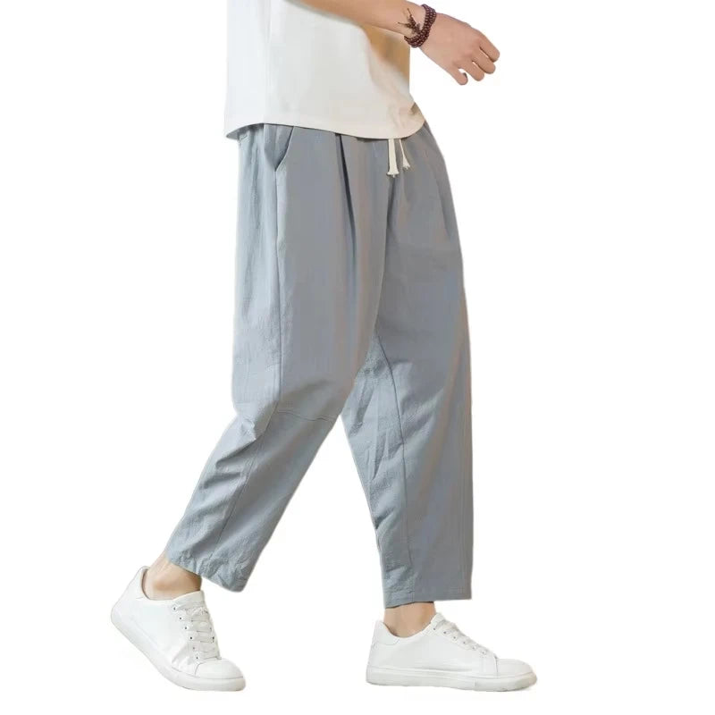 Saint Moritz Santorini loose fit trousers shown in beige fabric with relaxed style and wide-leg design.