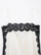 SAINT CLAIRE velour lace camisole featuring delicate lace details and soft velour fabric, shown in a close-up view.