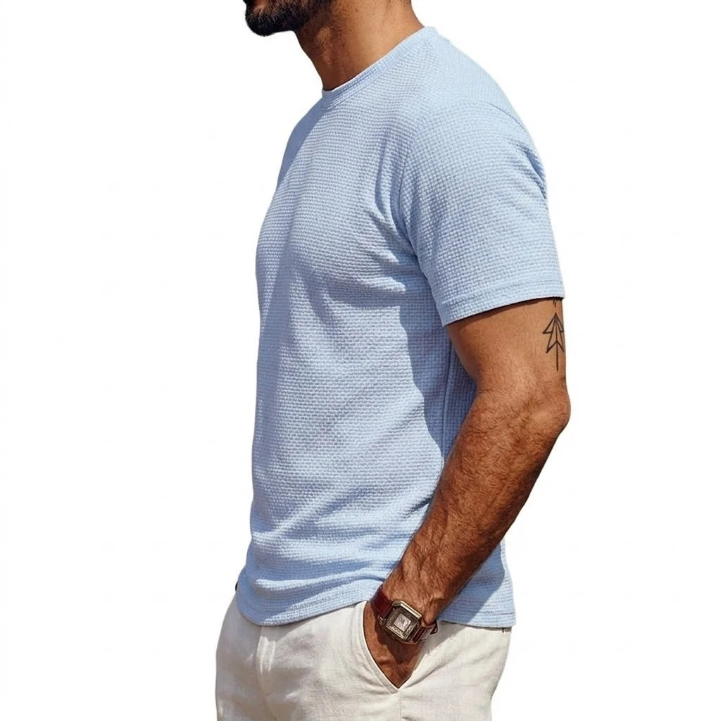 Saint Moritz Capri Lightweight Tee displayed on a model, showcasing its casual fit and soft fabric in a neutral color.