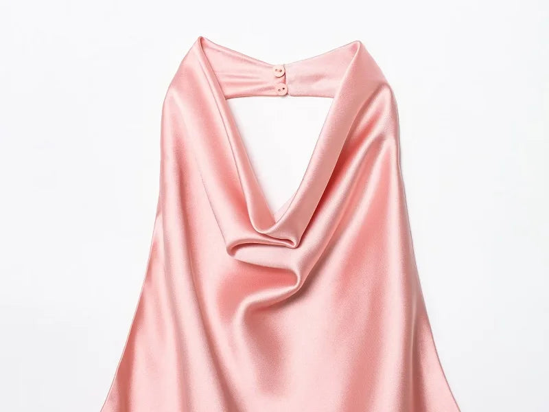 Black satin backless camisole by SAINT CLAIRE, featuring a smooth, elegant fabric and a sleek backless design for stylish wear.