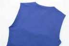 SAINT CLAIRE Épure Slim Bodysuit in black, form-fitting with long sleeves and scoop neckline, displayed on a mannequin.