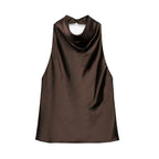 Black satin backless camisole by SAINT CLAIRE, featuring a smooth satin fabric and stylish backless design.