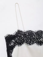 SAINT CLAIRE velour lace camisole featuring delicate lace details and soft velour fabric, shown on a neutral background