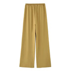 SAINT CLAIRE Capri two-piece set featuring a stylish crop top and matching wide-leg pants, perfect for casual or summer wear.
