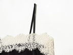 SAINT CLAIRE velour lace camisole featuring delicate lace detailing and soft velour fabric, displayed on a neutral background.