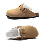 Saint Moritz St. Moritz Clog featuring a wooden sole and leather upper, showcasing a stylish and comfortable footwear design.