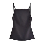 SAINT CLAIRE Celeste Cami Top in soft fabric, featuring a sleeveless design and delicate straps, displayed on a hanger.