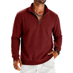 Saint Moritz Aspen Striped Half-Zip sweater featuring a stylish striped pattern and a half-zip collar.