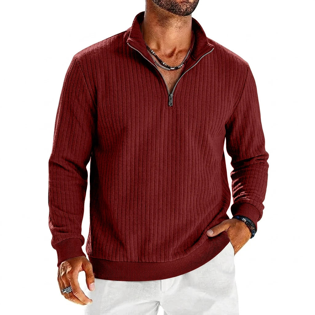 Saint Moritz Aspen Striped Half-Zip sweater featuring a stylish striped pattern and a half-zip collar.