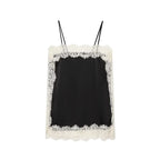 SAINT CLAIRE velour lace camisole featuring delicate lace details and soft velour fabric, shown in a close-up view.