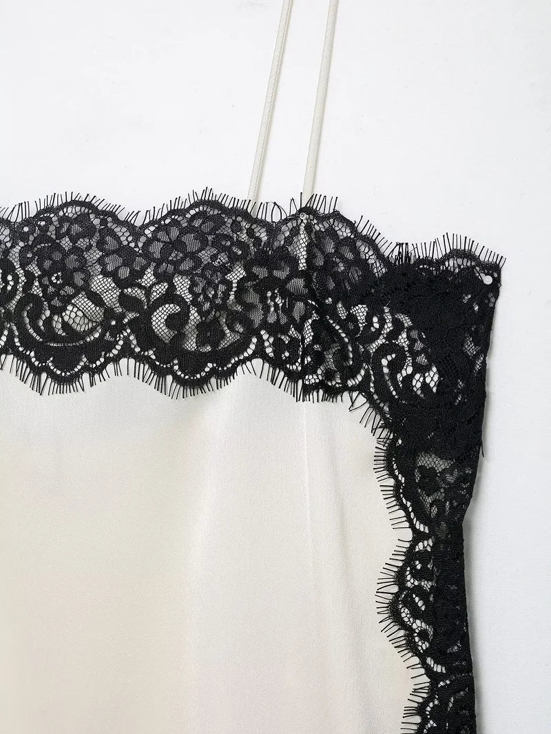 SAINT CLAIRE velour lace camisole featuring delicate lace trim and soft velour fabric, displayed on a neutral background