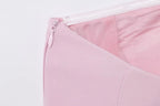 SAINT CLAIRE Épure backless top in soft fabric, featuring a sleek design with open back and stylish fit for elegant look.