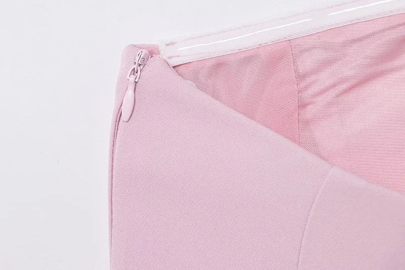 SAINT CLAIRE Épure backless top in soft fabric, featuring a sleek design with open back and stylish fit for elegant look.