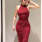 SAINT CLAIRE Milano dress displayed on a hanger, showcasing its elegant design and fabric details for women’s fashion.