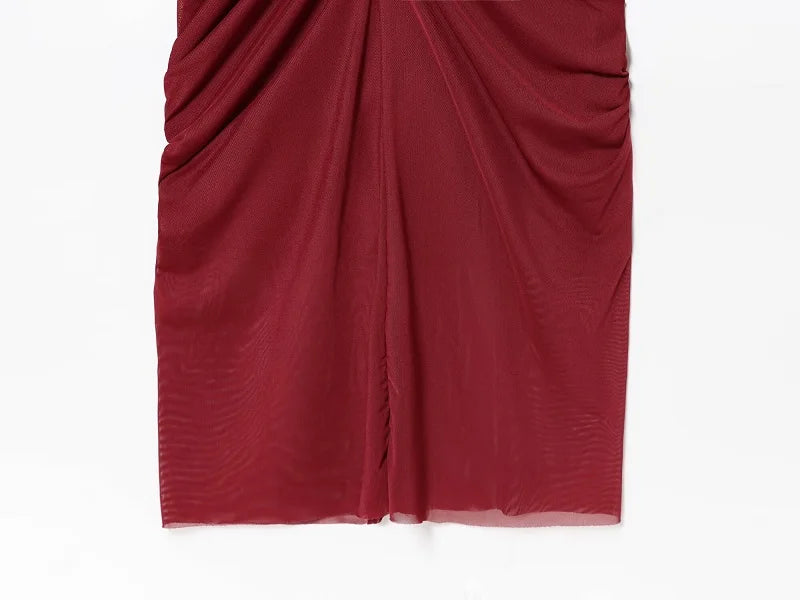 SAINT CLAIRE Milano Dress displayed in a stylish, flowing design with elegant fabric and a flattering silhouette.