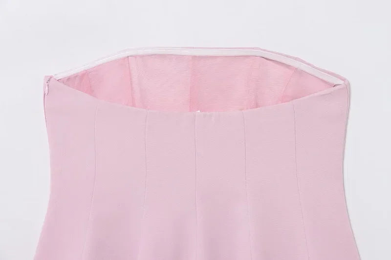 SAINT CLAIRE Épure backless top in soft fabric, featuring a sleek design and open back, perfect for stylish summer wear.