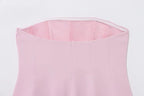 SAINT CLAIRE Épure backless top in soft fabric, featuring a sleek design and open back, perfect for stylish summer wear.