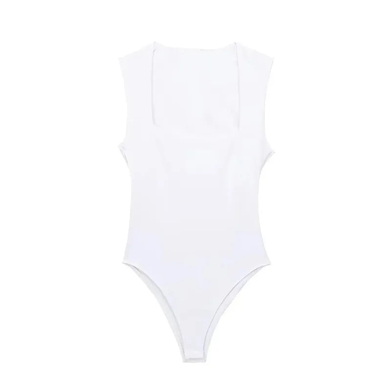 SAINT CLAIRE Épure Slim Bodysuit in black, featuring seamless design and fitted silhouette, displayed on a mannequin.